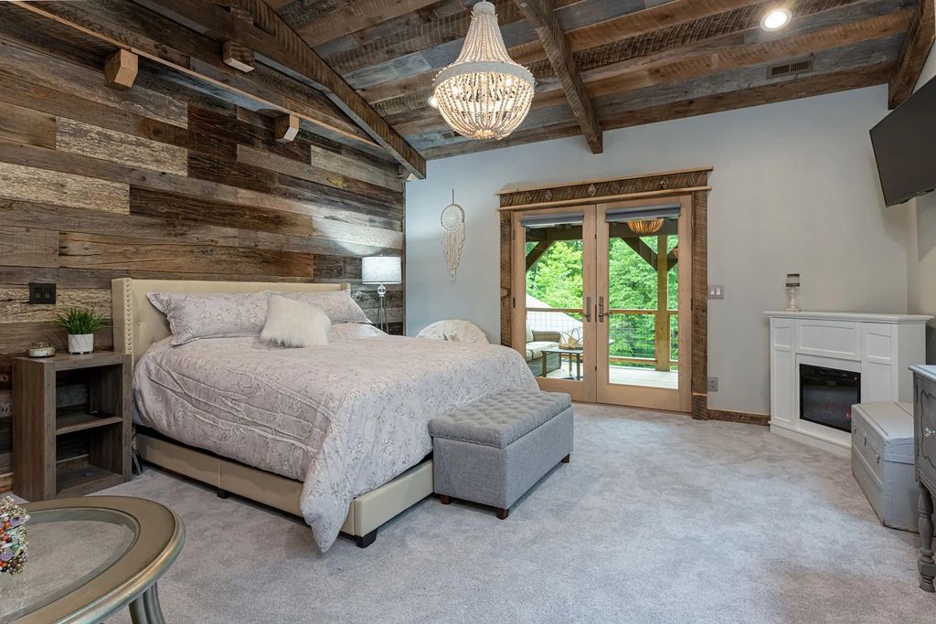 The Estate in Canton incorporates elements from the land with sustainable materials, now available for sale. This home located at 16 Gihon Waters Trl, Canton, North Carolina