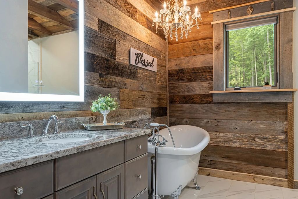 The Estate in Canton incorporates elements from the land with sustainable materials, now available for sale. This home located at 16 Gihon Waters Trl, Canton, North Carolina