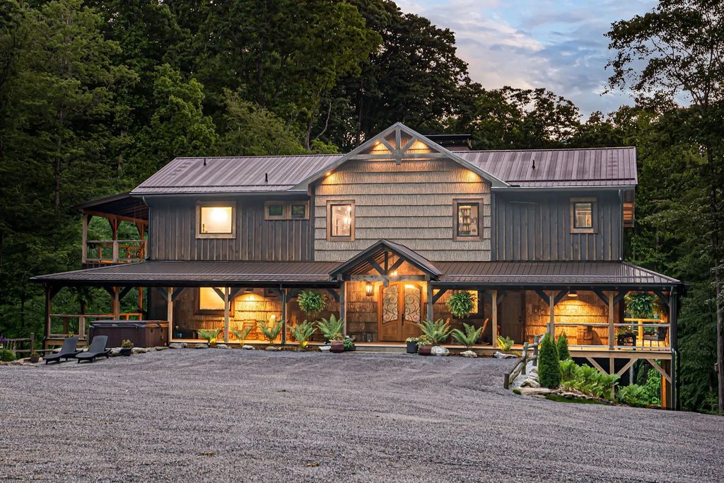 The Estate in Canton incorporates elements from the land with sustainable materials, now available for sale. This home located at 16 Gihon Waters Trl, Canton, North Carolina