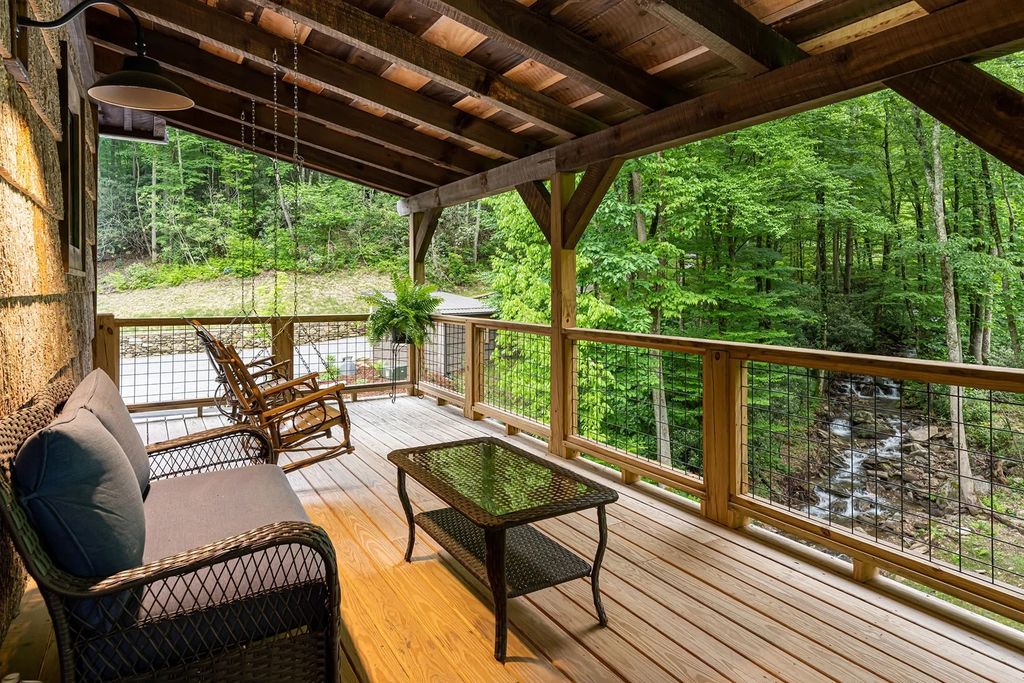 The Estate in Canton incorporates elements from the land with sustainable materials, now available for sale. This home located at 16 Gihon Waters Trl, Canton, North Carolina