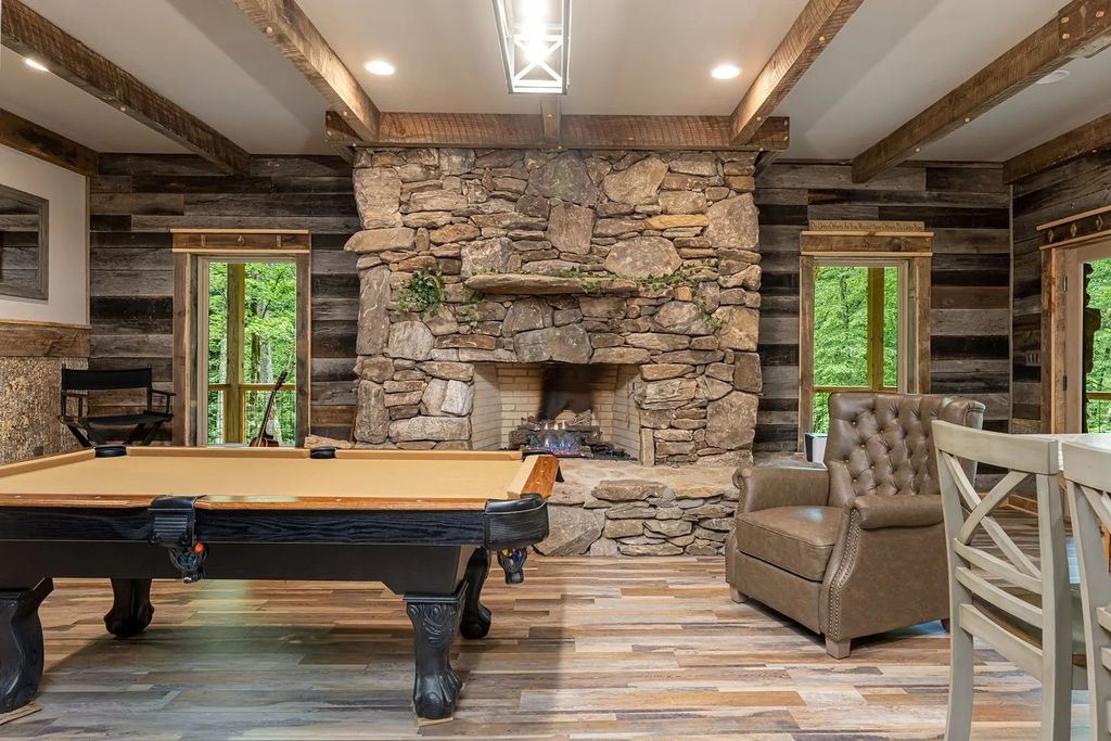 The Estate in Canton incorporates elements from the land with sustainable materials, now available for sale. This home located at 16 Gihon Waters Trl, Canton, North Carolina