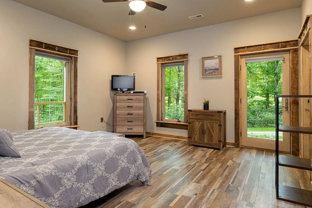 The Estate in Canton incorporates elements from the land with sustainable materials, now available for sale. This home located at 16 Gihon Waters Trl, Canton, North Carolina