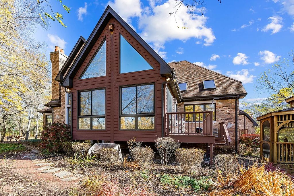 The Residence in Morris is surrounded by majestic, mature trees leading to your own private paradise, now available for sale. This home located at 4965 Cemetery Rd, Morris, Illinois