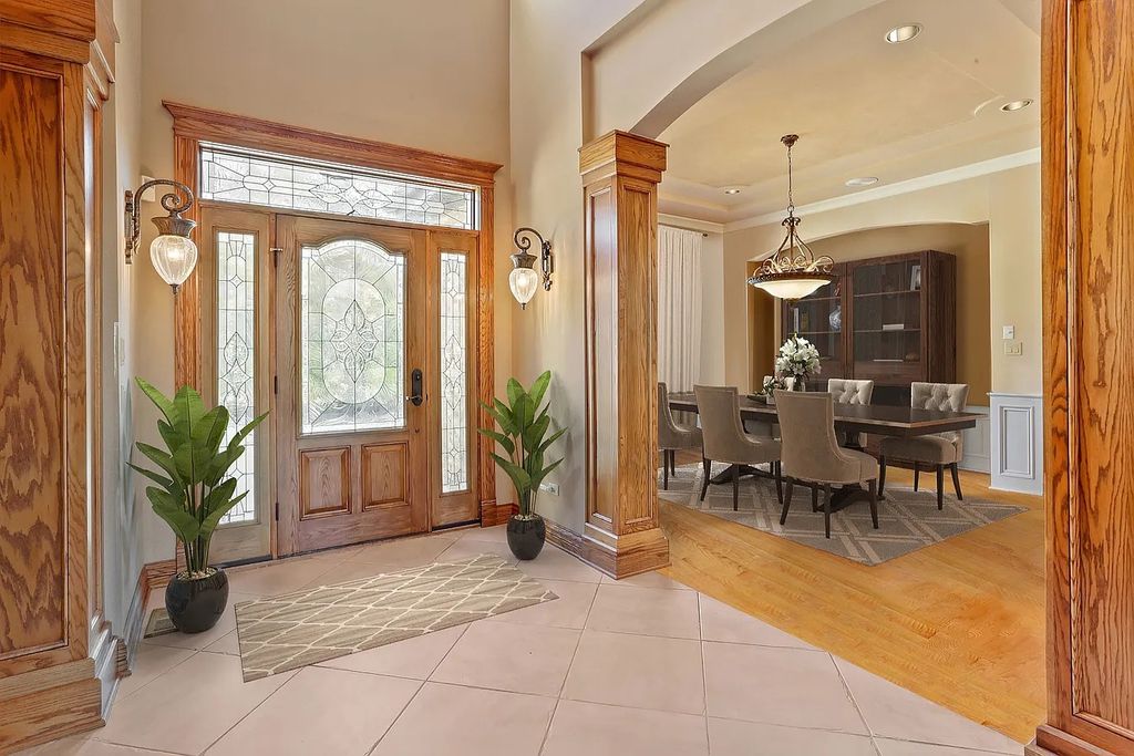 The Residence in Morris is surrounded by majestic, mature trees leading to your own private paradise, now available for sale. This home located at 4965 Cemetery Rd, Morris, Illinois