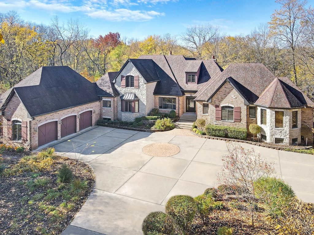 The Residence in Morris is surrounded by majestic, mature trees leading to your own private paradise, now available for sale. This home located at 4965 Cemetery Rd, Morris, Illinois