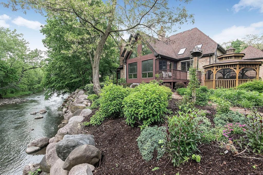 The Residence in Morris is surrounded by majestic, mature trees leading to your own private paradise, now available for sale. This home located at 4965 Cemetery Rd, Morris, Illinois