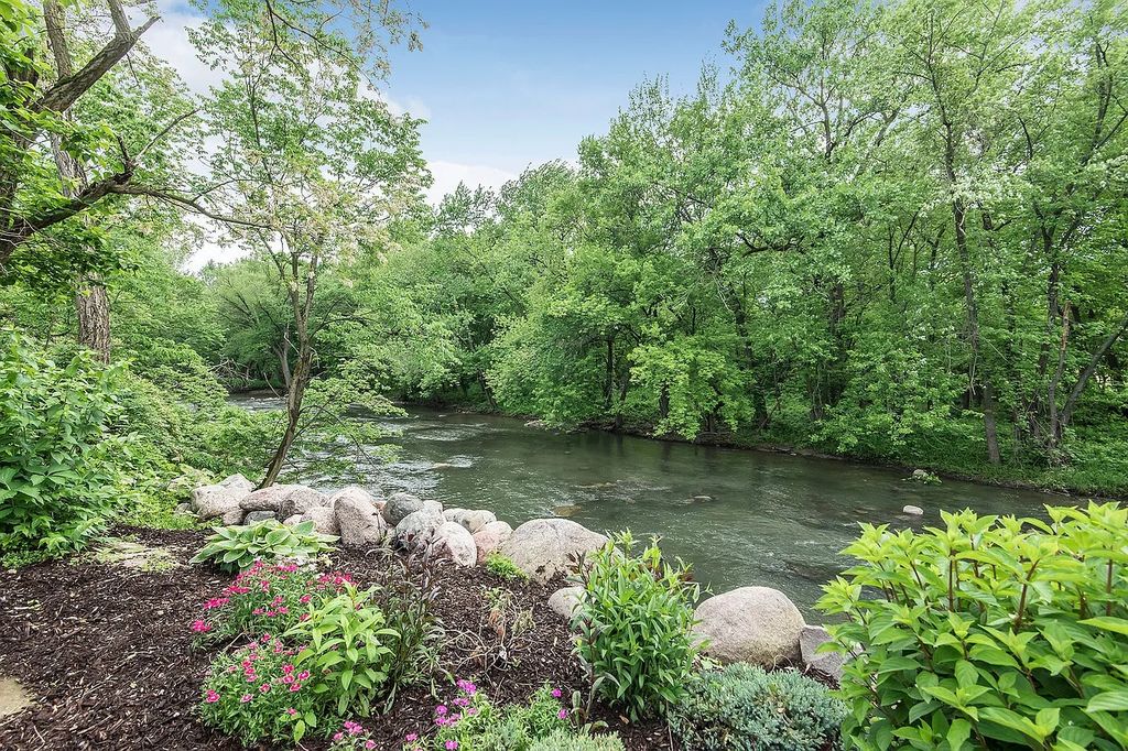 The Residence in Morris is surrounded by majestic, mature trees leading to your own private paradise, now available for sale. This home located at 4965 Cemetery Rd, Morris, Illinois