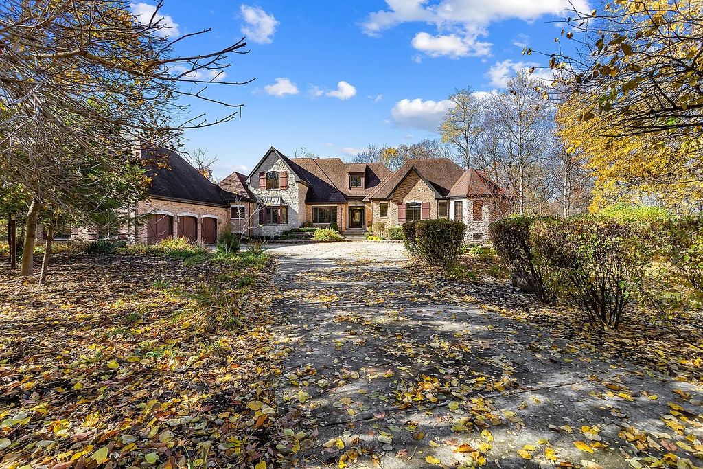 The Residence in Morris is surrounded by majestic, mature trees leading to your own private paradise, now available for sale. This home located at 4965 Cemetery Rd, Morris, Illinois