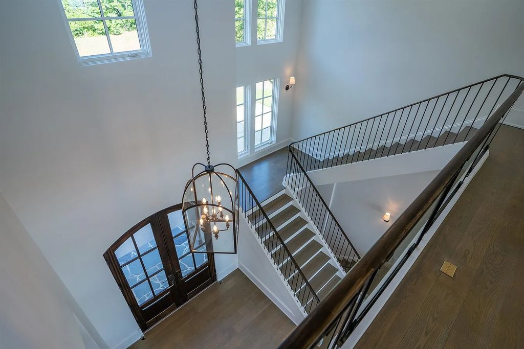 The Property in Eatonton boasts expert craftsmanship and the finest materials, resulting in a true masterpiece, now available for sale. This home located at 202 Eagles Way, Eatonton, Georgia