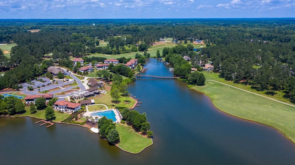 The Property in Eatonton boasts expert craftsmanship and the finest materials, resulting in a true masterpiece, now available for sale. This home located at 202 Eagles Way, Eatonton, Georgia