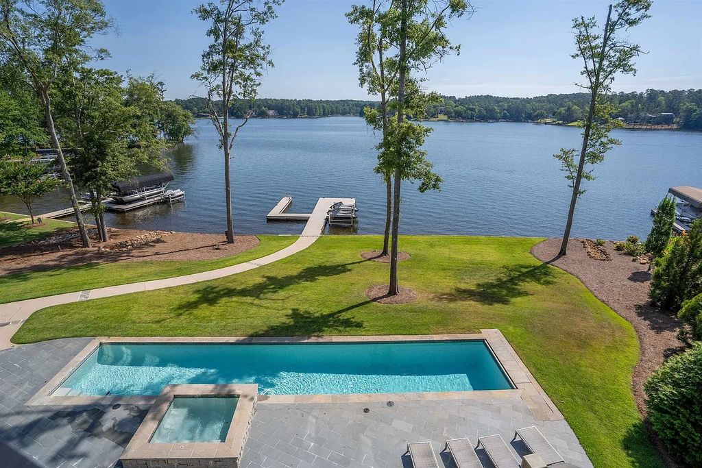 The Property in Eatonton boasts expert craftsmanship and the finest materials, resulting in a true masterpiece, now available for sale. This home located at 202 Eagles Way, Eatonton, Georgia
