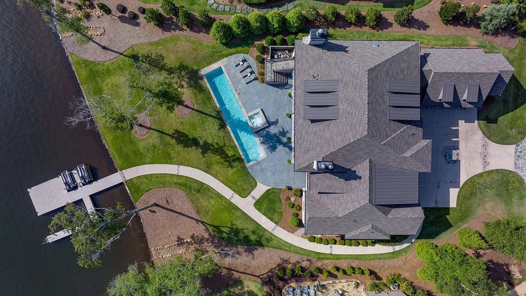 The Property in Eatonton boasts expert craftsmanship and the finest materials, resulting in a true masterpiece, now available for sale. This home located at 202 Eagles Way, Eatonton, Georgia