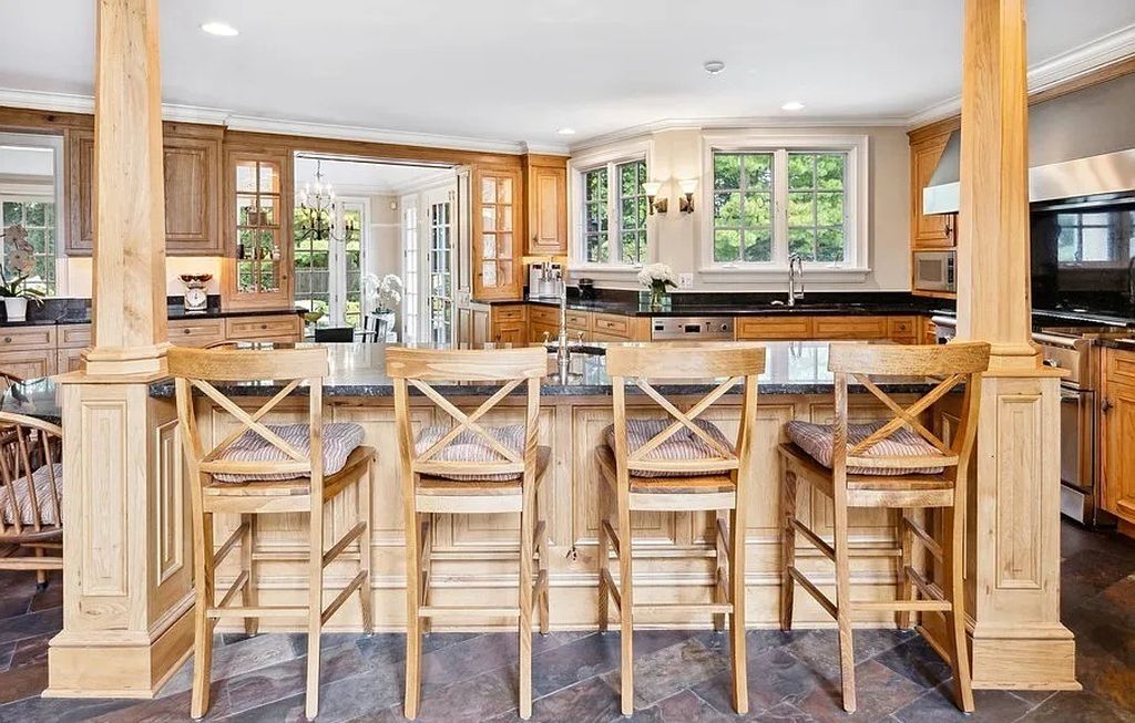 The Manor in Winnetka is built to withstand the test of time & beautifully enhanced by notable architects Liederbach & Graham, now available for sale. This home located at 45 Indian Hill Rd, Winnetka, Illinois