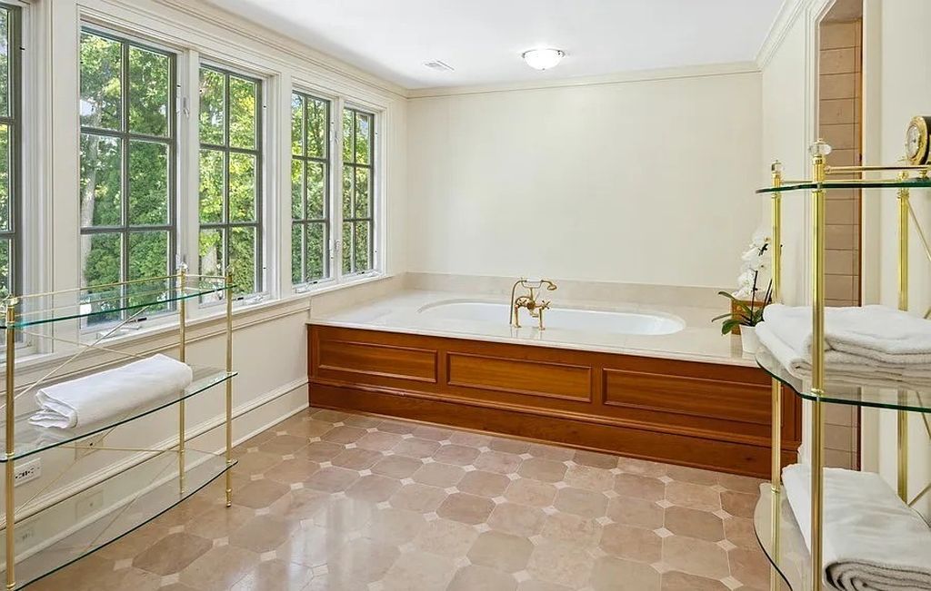 The Manor in Winnetka is built to withstand the test of time & beautifully enhanced by notable architects Liederbach & Graham, now available for sale. This home located at 45 Indian Hill Rd, Winnetka, Illinois