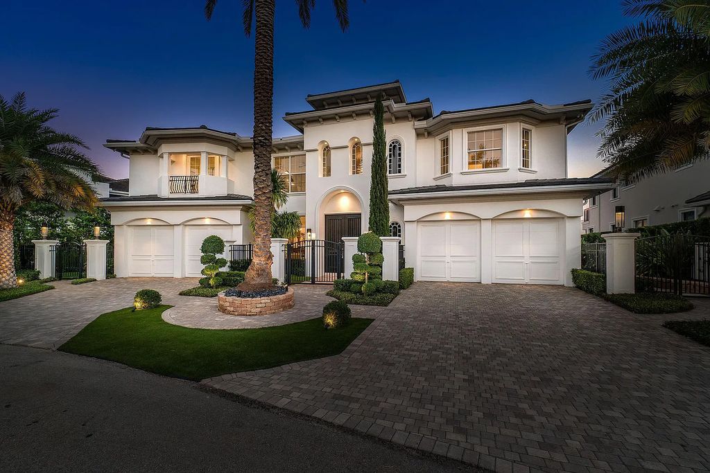 This exquisite 5 bedroom, 6 bathroom home is located on a prime waterfront lot in the highly sought-after area of Boca Raton, Florida. Built in 2003, 794 NE Harbour Drive boasts over 6,000 square feet of living space and sits on a spacious 0.22-acre lot. Upon entering the home, you'll be greeted by soaring ceilings and breathtaking water views that extend throughout the living areas, creating a bright and airy atmosphere.