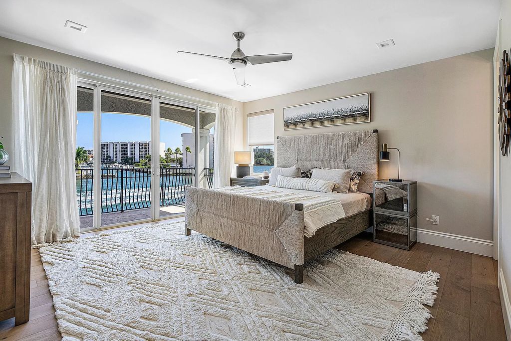 This exquisite 5 bedroom, 6 bathroom home is located on a prime waterfront lot in the highly sought-after area of Boca Raton, Florida. Built in 2003, 794 NE Harbour Drive boasts over 6,000 square feet of living space and sits on a spacious 0.22-acre lot. Upon entering the home, you'll be greeted by soaring ceilings and breathtaking water views that extend throughout the living areas, creating a bright and airy atmosphere.