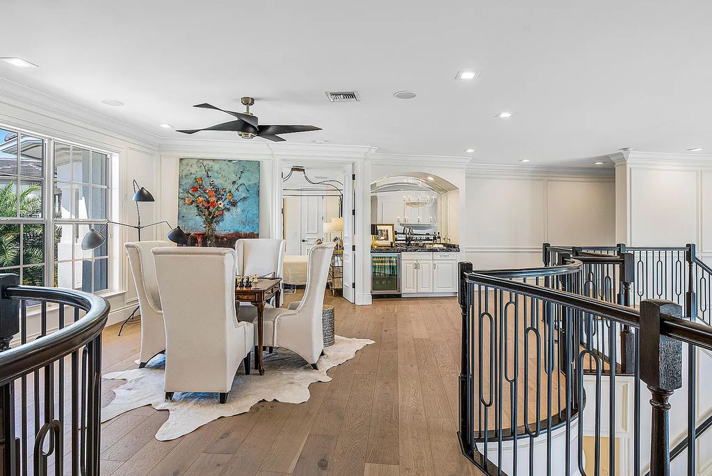 This exquisite 5 bedroom, 6 bathroom home is located on a prime waterfront lot in the highly sought-after area of Boca Raton, Florida. Built in 2003, 794 NE Harbour Drive boasts over 6,000 square feet of living space and sits on a spacious 0.22-acre lot. Upon entering the home, you'll be greeted by soaring ceilings and breathtaking water views that extend throughout the living areas, creating a bright and airy atmosphere.