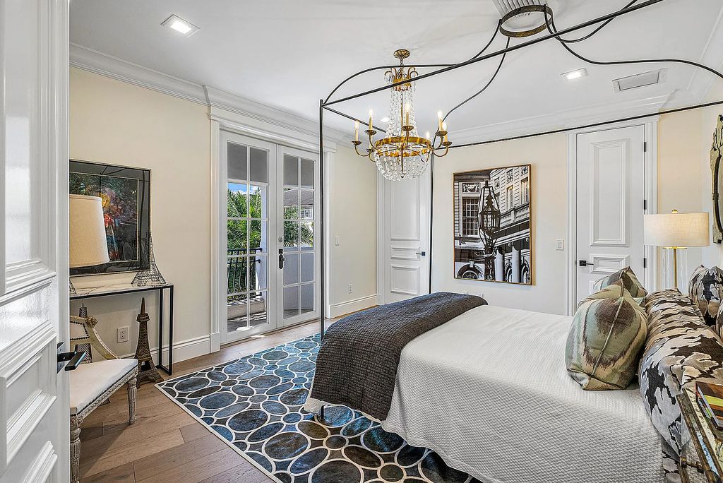 This exquisite 5 bedroom, 6 bathroom home is located on a prime waterfront lot in the highly sought-after area of Boca Raton, Florida. Built in 2003, 794 NE Harbour Drive boasts over 6,000 square feet of living space and sits on a spacious 0.22-acre lot. Upon entering the home, you'll be greeted by soaring ceilings and breathtaking water views that extend throughout the living areas, creating a bright and airy atmosphere.