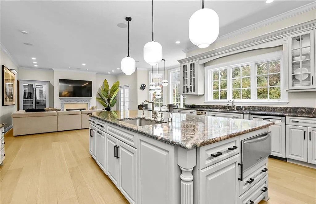 The Chateau in Armonk exudes warmth and luxurious comfort from the minute you enter, now available for sale. This home located at 4 Cowdray Park Drive, Armonk, New York