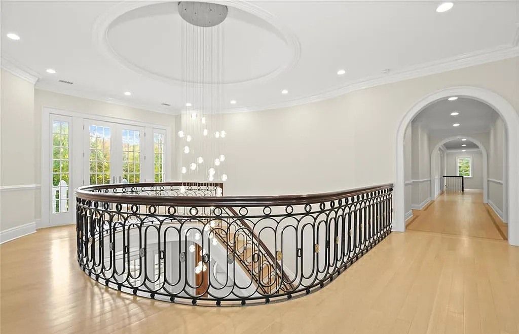 The Chateau in Armonk exudes warmth and luxurious comfort from the minute you enter, now available for sale. This home located at 4 Cowdray Park Drive, Armonk, New York