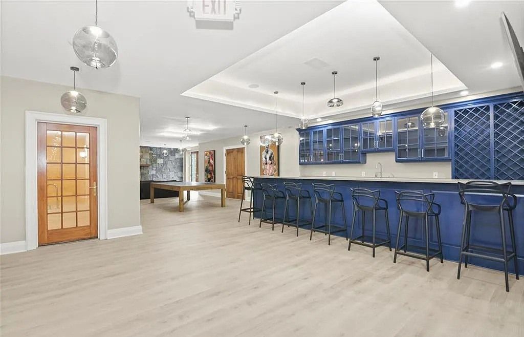 The Chateau in Armonk exudes warmth and luxurious comfort from the minute you enter, now available for sale. This home located at 4 Cowdray Park Drive, Armonk, New York