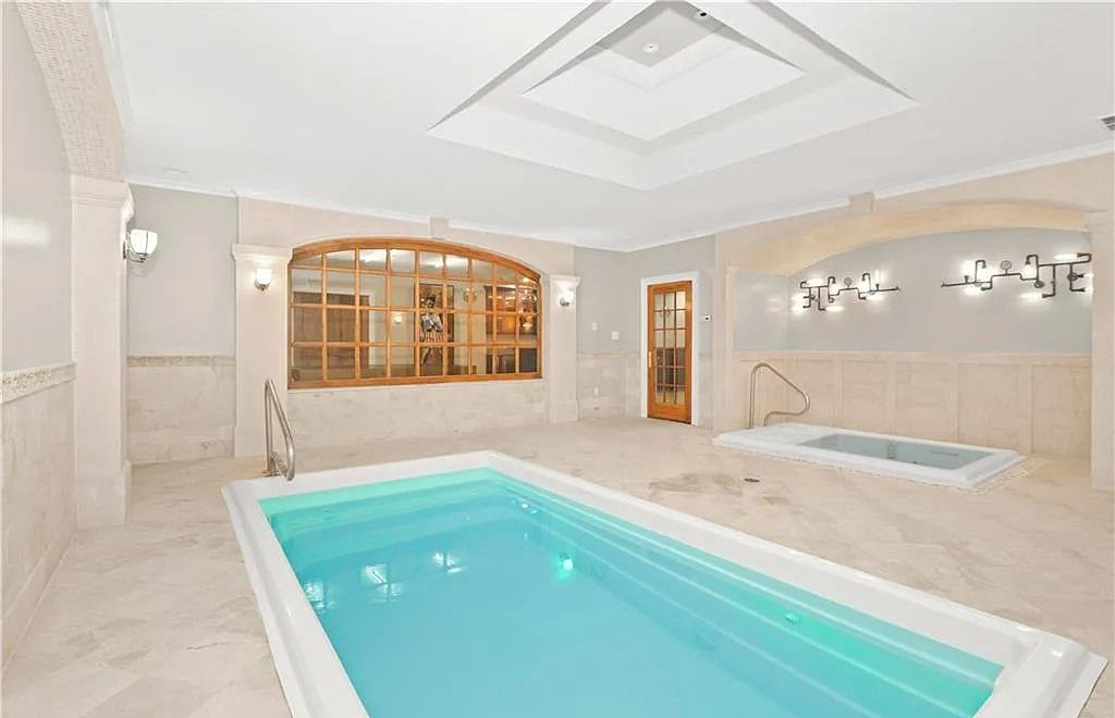 The Chateau in Armonk exudes warmth and luxurious comfort from the minute you enter, now available for sale. This home located at 4 Cowdray Park Drive, Armonk, New York