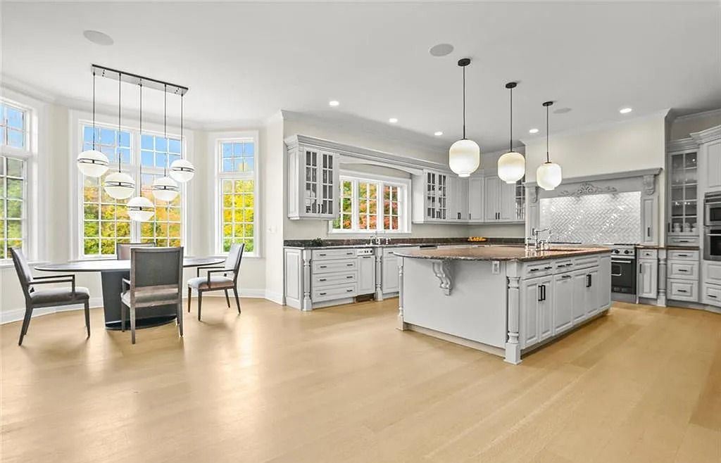 The Chateau in Armonk exudes warmth and luxurious comfort from the minute you enter, now available for sale. This home located at 4 Cowdray Park Drive, Armonk, New York