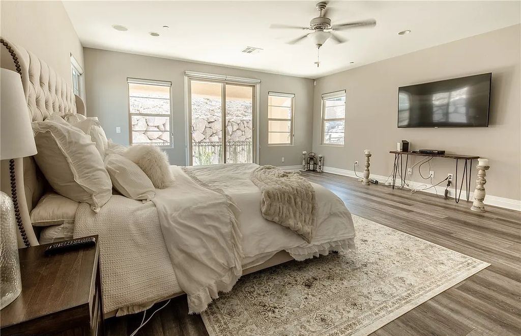 89 Olympia Chase Drive, Las Vegas, Nevada is a stunning executive home in the highly sought-after Southern Highlands Country Club Community with many designer finishes throughout for entertaining and relaxing.