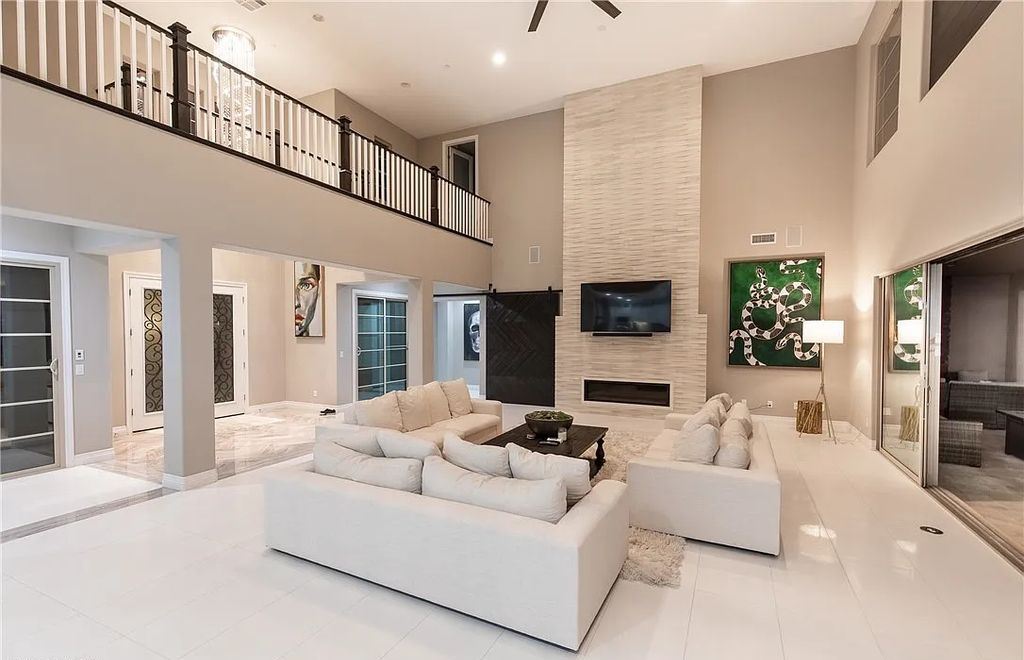 89 Olympia Chase Drive, Las Vegas, Nevada is a stunning executive home in the highly sought-after Southern Highlands Country Club Community with many designer finishes throughout for entertaining and relaxing.