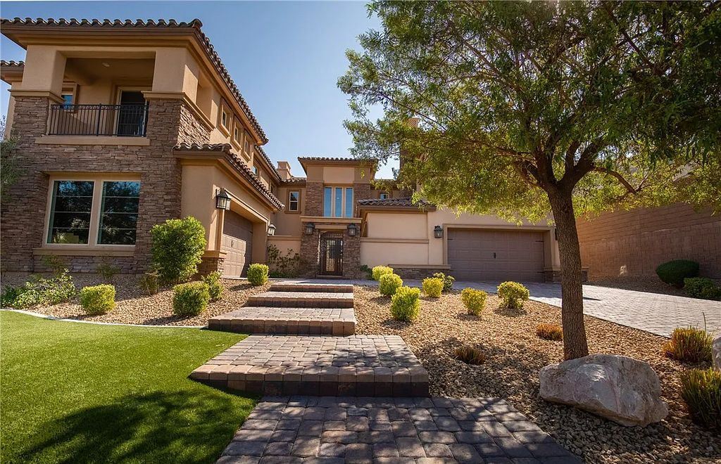 89 Olympia Chase Drive, Las Vegas, Nevada is a stunning executive home in the highly sought-after Southern Highlands Country Club Community with many designer finishes throughout for entertaining and relaxing.