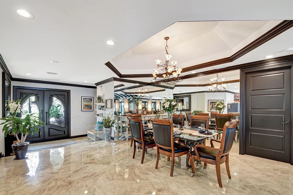 1 Duke Drive in Lake Worth, Florida offers a stunning waterfront living experience. Built in 1962, the house features 3 bedrooms and 3 bathrooms spread over a spacious 2,880 square feet of living space. The lot size is 0.29 acres, providing ample outdoor space for relaxation and entertainment.