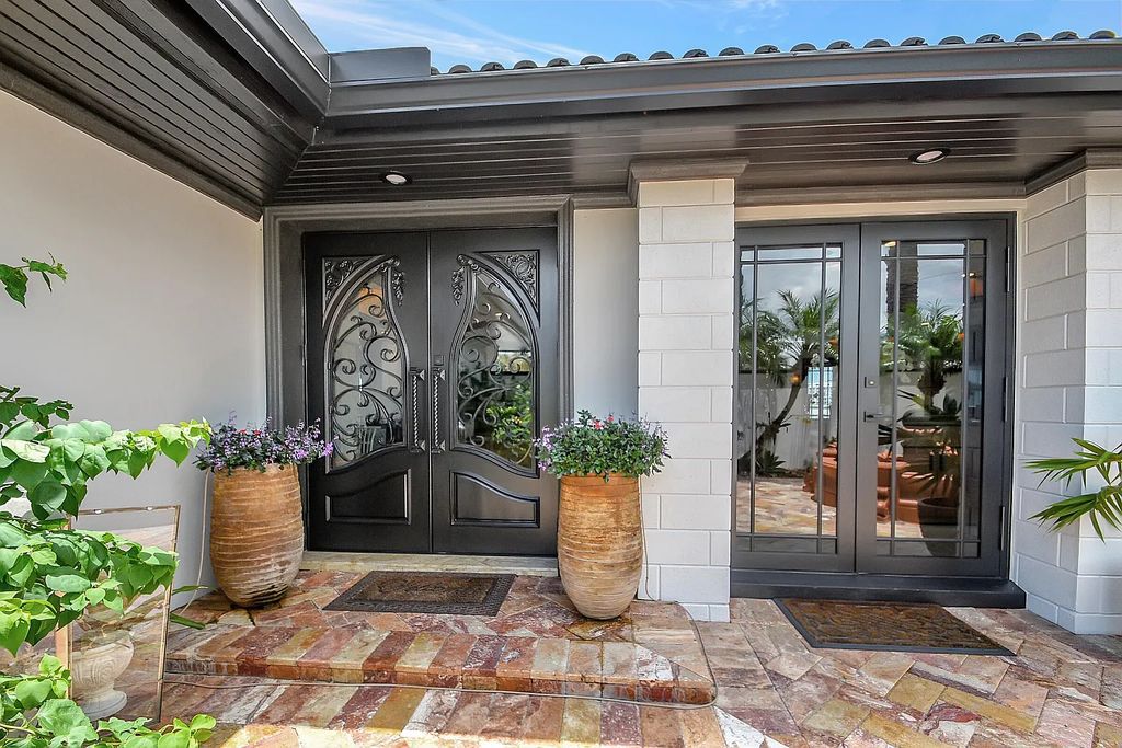 1 Duke Drive in Lake Worth, Florida offers a stunning waterfront living experience. Built in 1962, the house features 3 bedrooms and 3 bathrooms spread over a spacious 2,880 square feet of living space. The lot size is 0.29 acres, providing ample outdoor space for relaxation and entertainment.