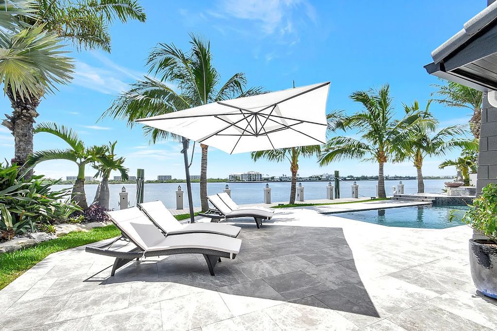 1 Duke Drive in Lake Worth, Florida offers a stunning waterfront living experience. Built in 1962, the house features 3 bedrooms and 3 bathrooms spread over a spacious 2,880 square feet of living space. The lot size is 0.29 acres, providing ample outdoor space for relaxation and entertainment.