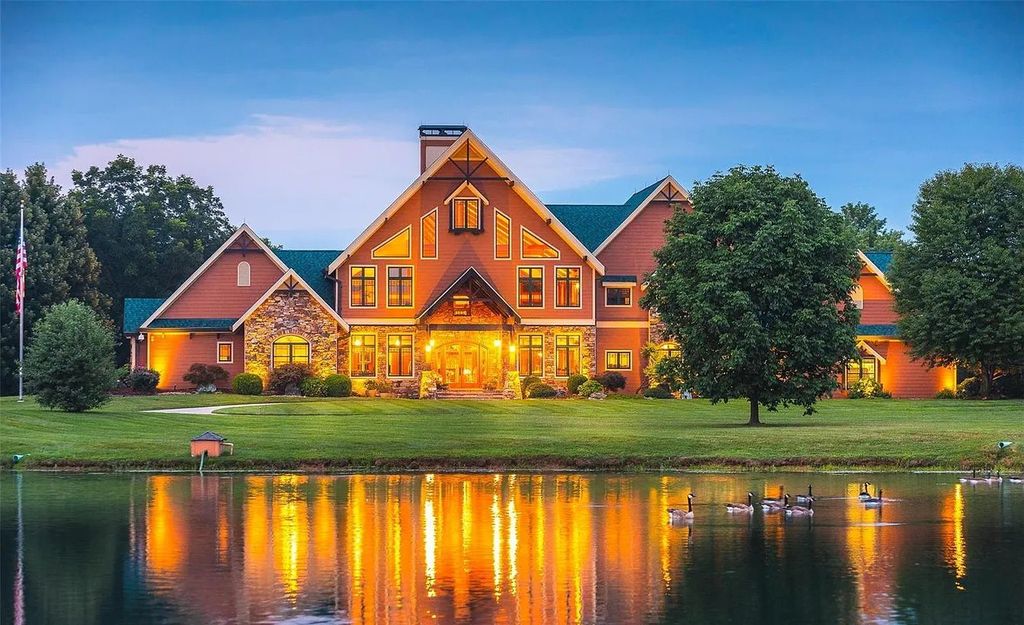 The Estate in Godfrey is a luxurious home with built-in lighting perfect for family fun, now available for sale. This home located at 702 Seiler Rd, Godfrey, Illinois