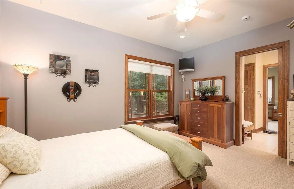 The Estate in Godfrey is a luxurious home with built-in lighting perfect for family fun, now available for sale. This home located at 702 Seiler Rd, Godfrey, Illinois