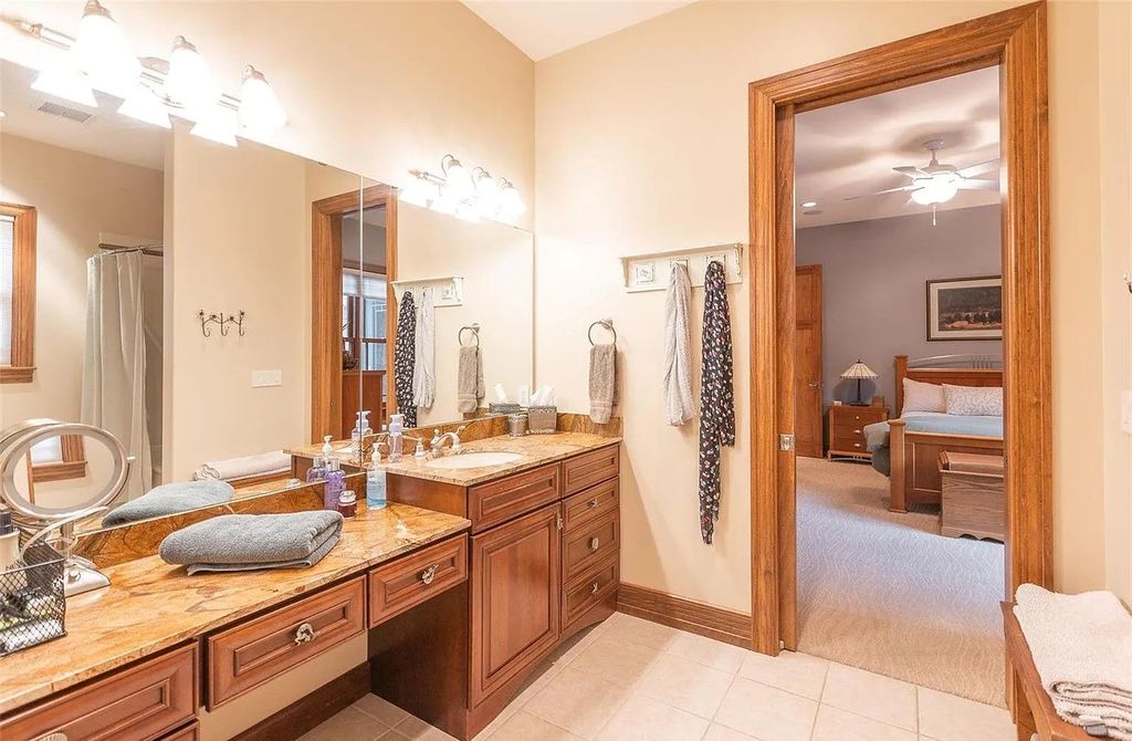 The Estate in Godfrey is a luxurious home with built-in lighting perfect for family fun, now available for sale. This home located at 702 Seiler Rd, Godfrey, Illinois