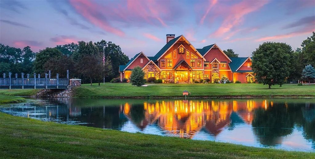 The Estate in Godfrey is a luxurious home with built-in lighting perfect for family fun, now available for sale. This home located at 702 Seiler Rd, Godfrey, Illinois