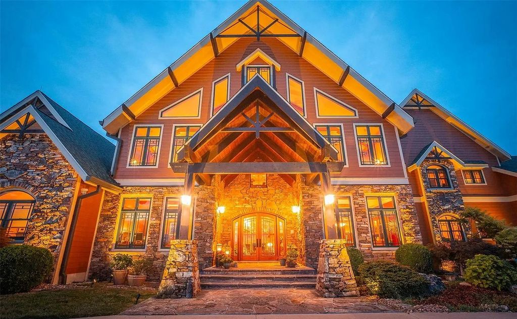 The Estate in Godfrey is a luxurious home with built-in lighting perfect for family fun, now available for sale. This home located at 702 Seiler Rd, Godfrey, Illinois