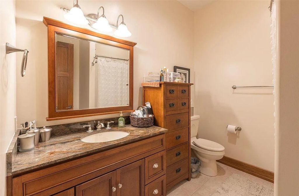 The Estate in Godfrey is a luxurious home with built-in lighting perfect for family fun, now available for sale. This home located at 702 Seiler Rd, Godfrey, Illinois