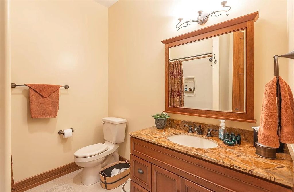 The Estate in Godfrey is a luxurious home with built-in lighting perfect for family fun, now available for sale. This home located at 702 Seiler Rd, Godfrey, Illinois