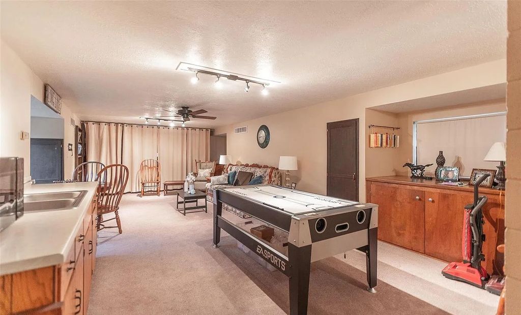 The Estate in Godfrey is a luxurious home with built-in lighting perfect for family fun, now available for sale. This home located at 702 Seiler Rd, Godfrey, Illinois