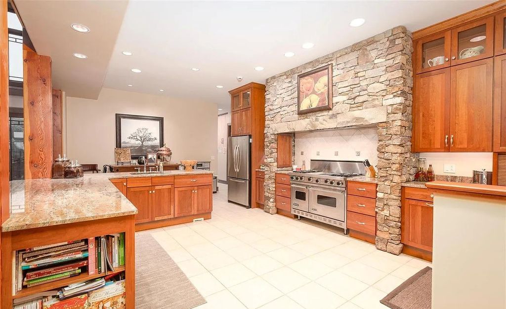 The Estate in Godfrey is a luxurious home with built-in lighting perfect for family fun, now available for sale. This home located at 702 Seiler Rd, Godfrey, Illinois
