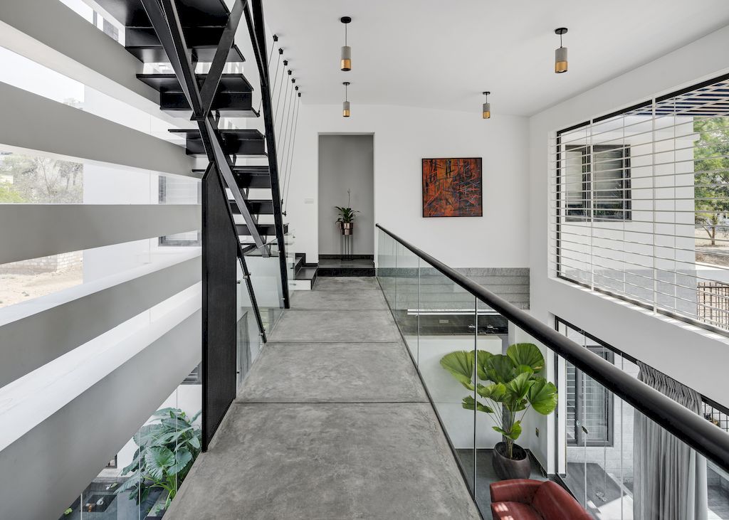 The Elemental, an Intimate 4 Bedroom Tropical Home by Ashwin Architects