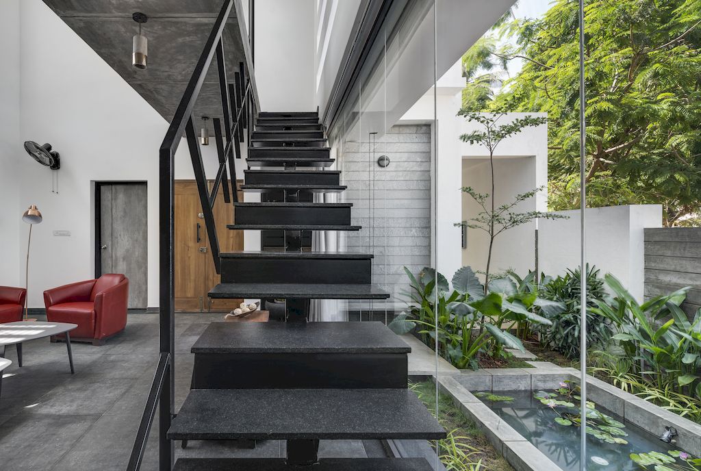 The Elemental, an Intimate 4 Bedroom Tropical Home by Ashwin Architects