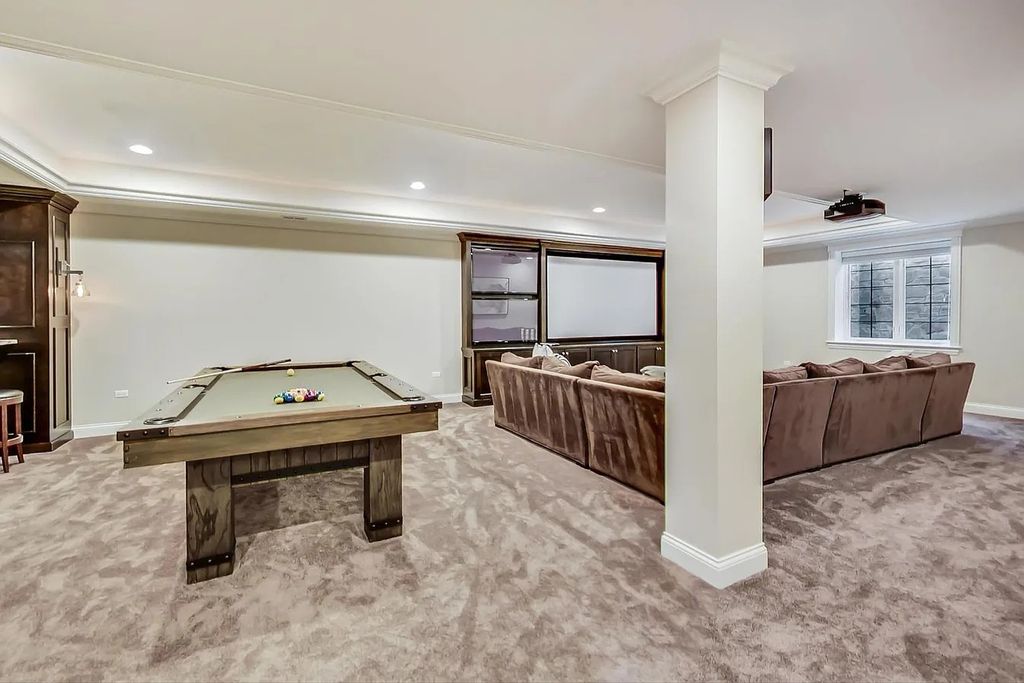 The House in Naperville is a stunning custom home built by a local luxury builder, now available for sale. This home located at 960 E Porter Ave, Naperville, Illinois