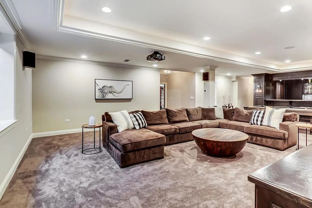 The House in Naperville is a stunning custom home built by a local luxury builder, now available for sale. This home located at 960 E Porter Ave, Naperville, Illinois