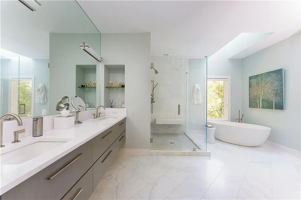 The Estate in Sandy Springs is a luxurious home emphasizing the connection between contemporary architecture and beautiful outdoor spaces now available for sale. This home located at 45 Finch Forest Trl, Sandy Springs, Georgia; offering 04 bedrooms and 07 bathrooms with 7,351 square feet of living spaces.