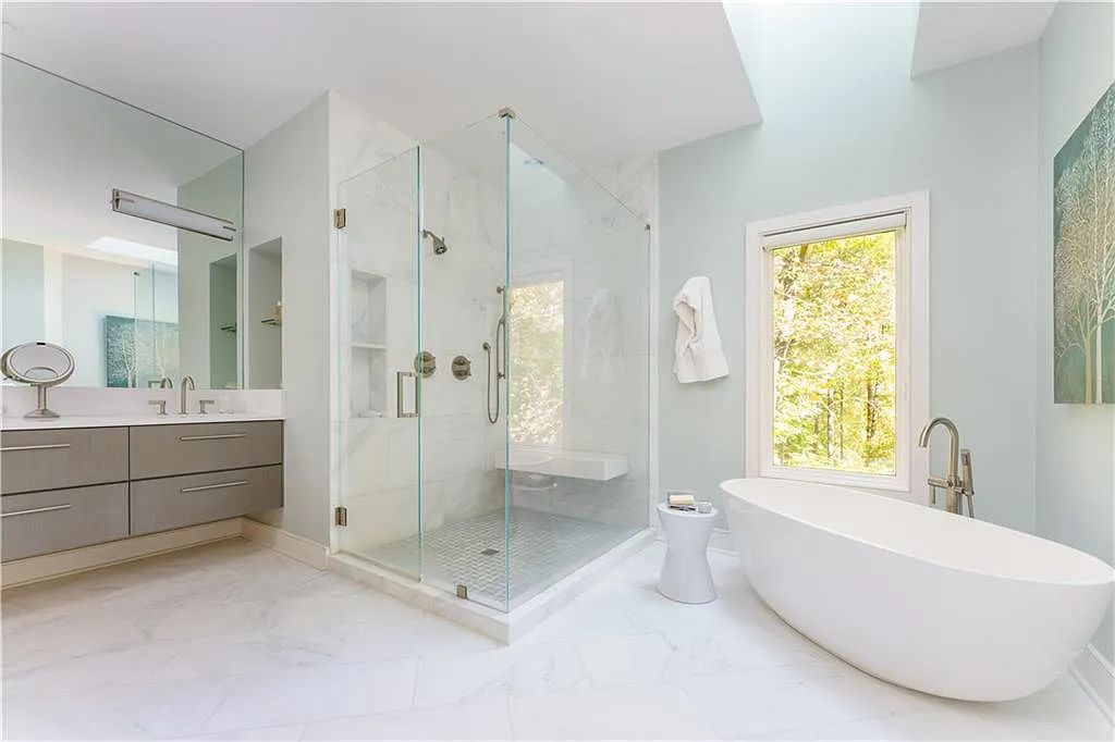 The Estate in Sandy Springs is a luxurious home emphasizing the connection between contemporary architecture and beautiful outdoor spaces now available for sale. This home located at 45 Finch Forest Trl, Sandy Springs, Georgia; offering 04 bedrooms and 07 bathrooms with 7,351 square feet of living spaces.