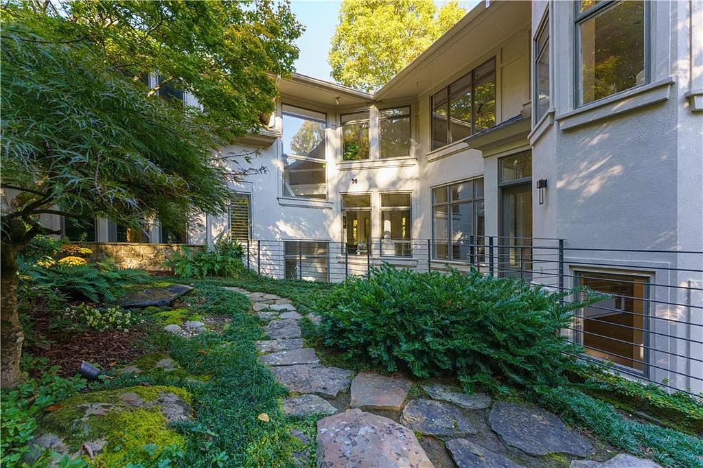 The Estate in Sandy Springs is a luxurious home emphasizing the connection between contemporary architecture and beautiful outdoor spaces now available for sale. This home located at 45 Finch Forest Trl, Sandy Springs, Georgia; offering 04 bedrooms and 07 bathrooms with 7,351 square feet of living spaces.