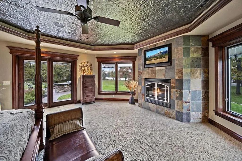 The Estate in Stevens Point is a luxurious home with a gated entrance, a lighted driveway to open up a paradise of entertainment for you now available for sale. This home located at 2688 Scenic Drive, Stevens Point, Wisconsin; offering 03 bedrooms and 05 bathrooms with 7,095 square feet of living spaces.
